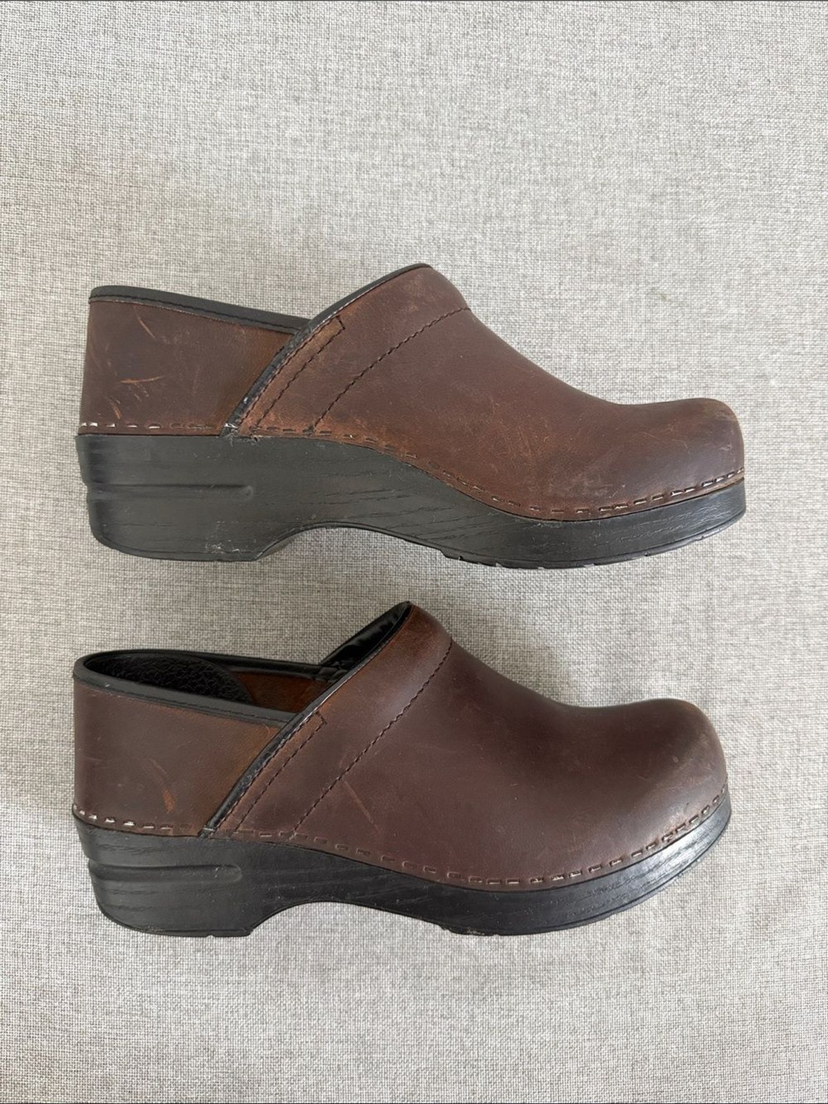 Dansko Brown Leather Slip-On Clogs with Black Trim