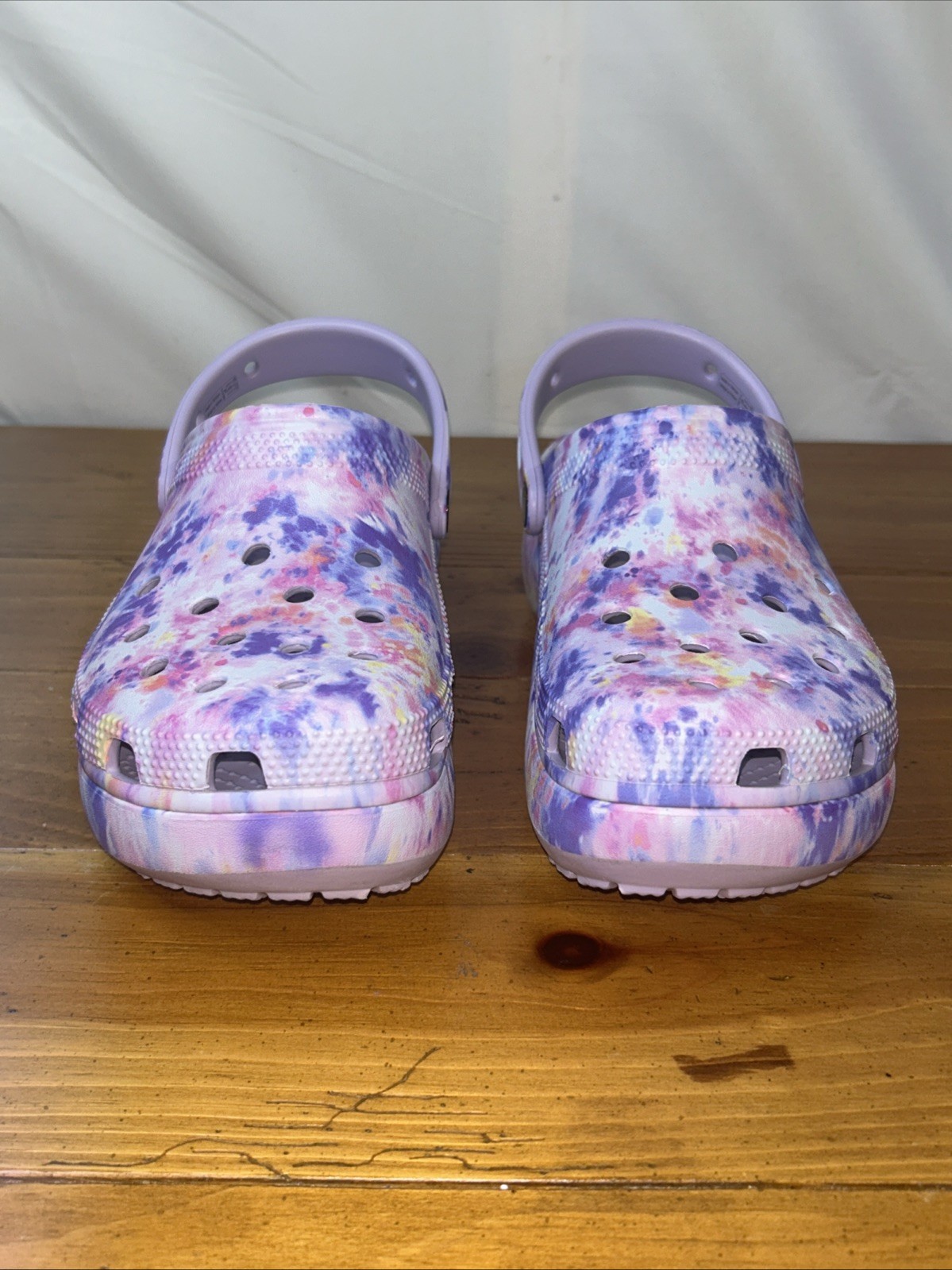Crocs Classic Platform Clogs with a tie-dye pattern. Size 8