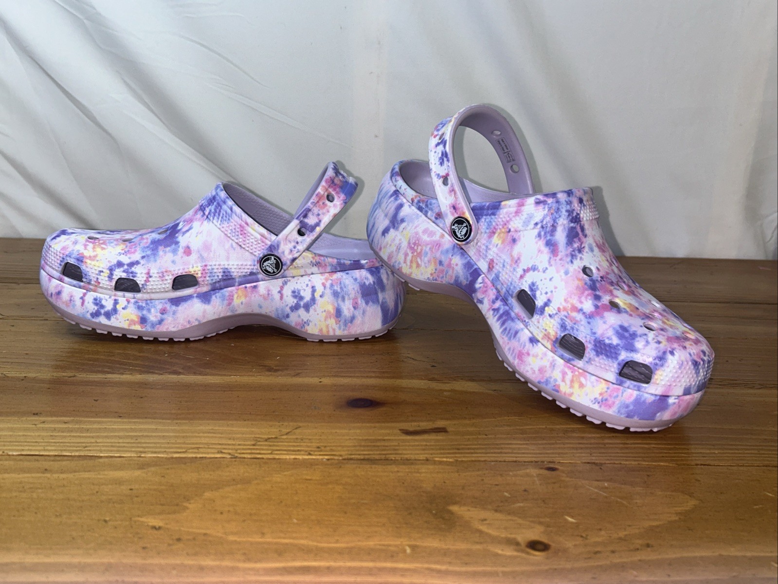 Crocs Classic Platform Clogs with a tie-dye pattern. Size 8