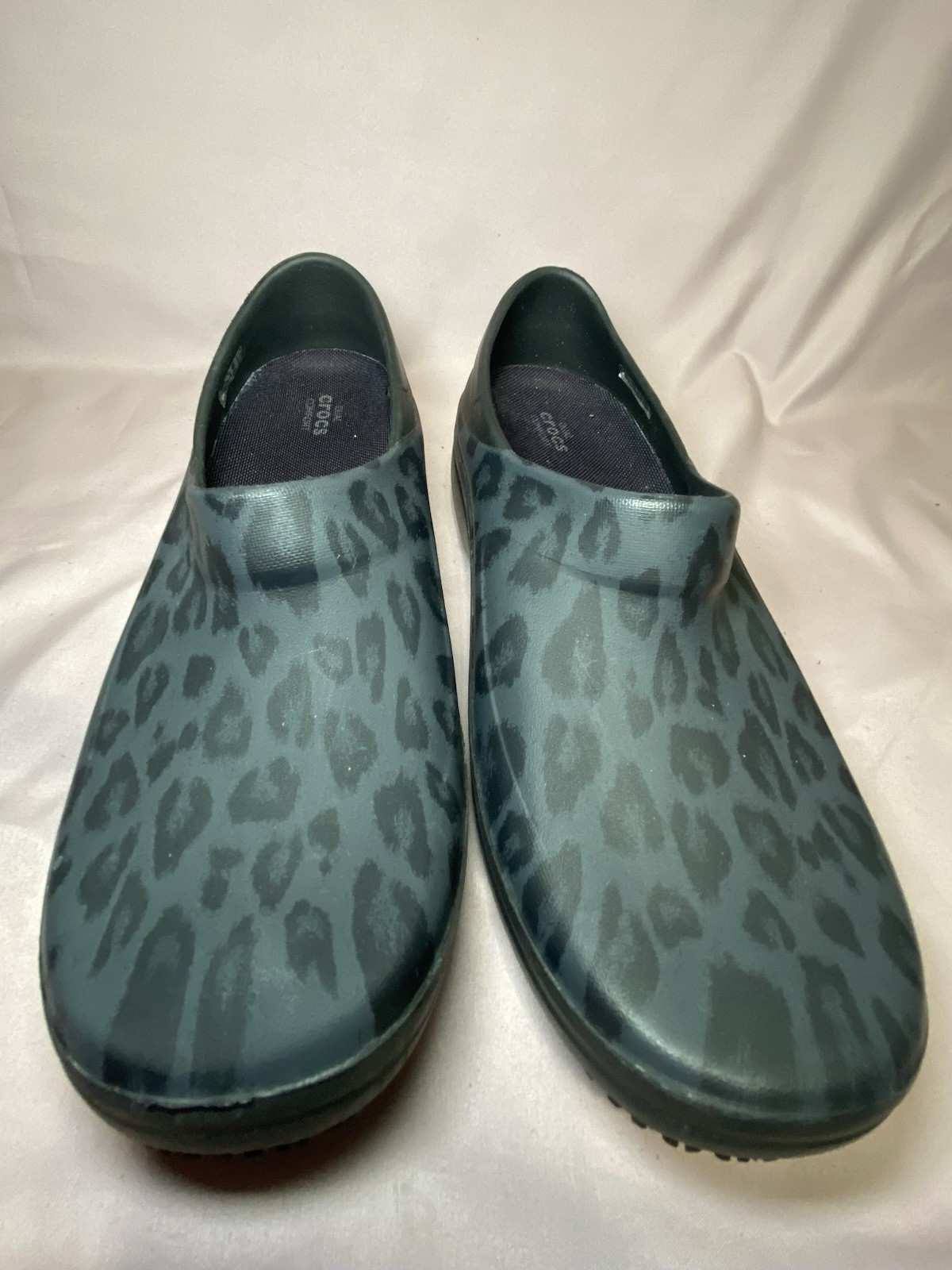 Women’s Crocs Neria Pro II Graphic Work Clogs with a leopard print size 6