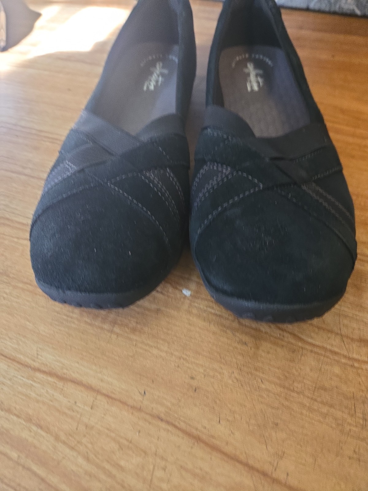 black suede Clarks Haley Jay slip-on comfort flats, crisscross elastic Straps