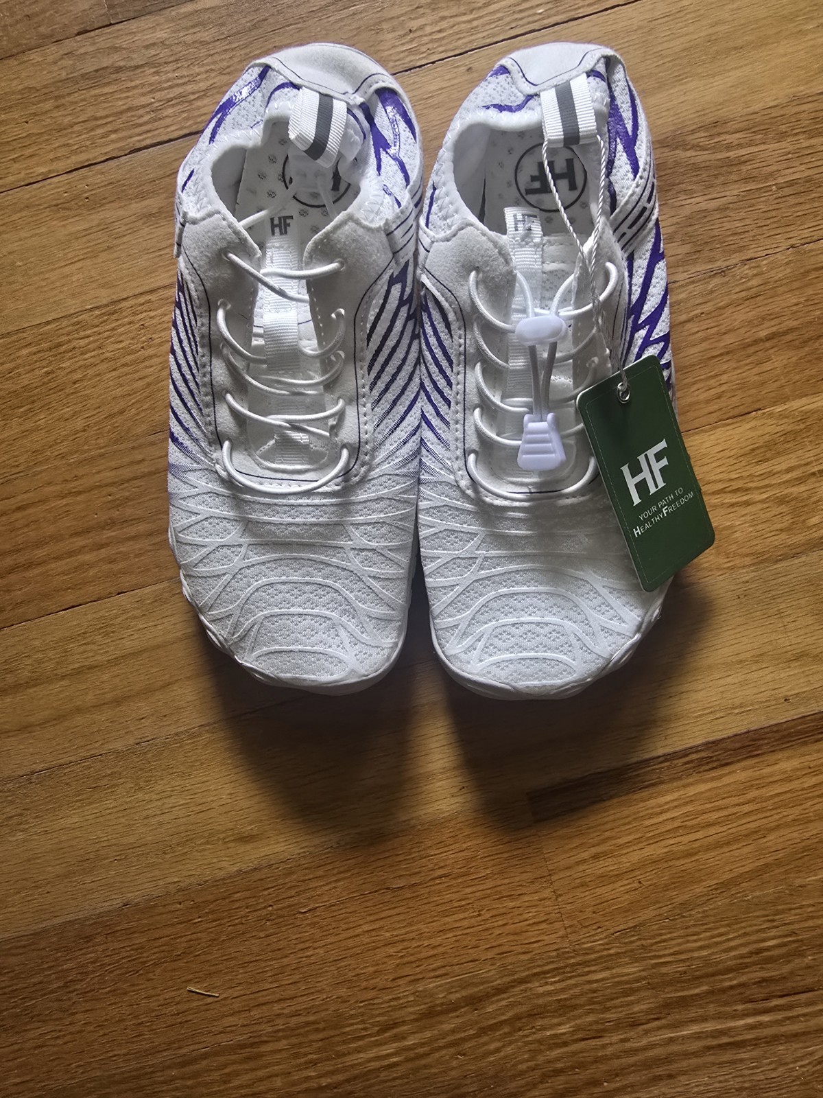 Hike Footwear “Lorax Pro” white and purple barefoot shoes featuring a drawstring