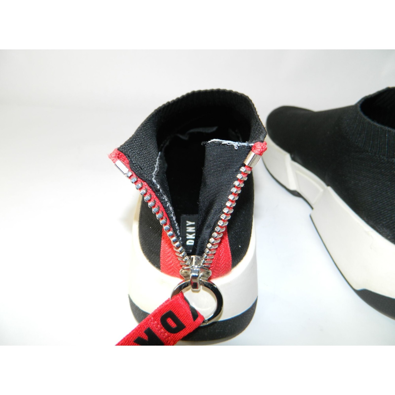 DKNY Marcel Wedge Flat Sneakers Black Stretchy Booties Size 10 Red Stripe Zipper