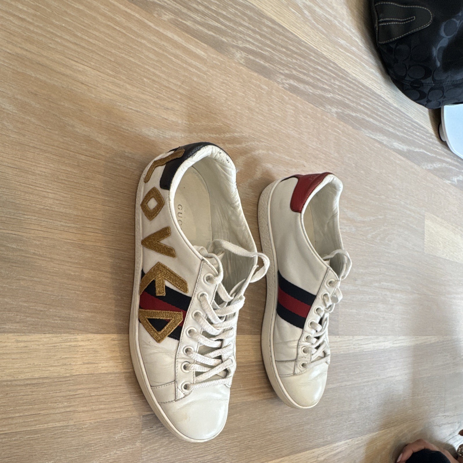 Gucci Women’s Ace Sneaker (LOVED). 37.5 but fits like a women’s size 9.