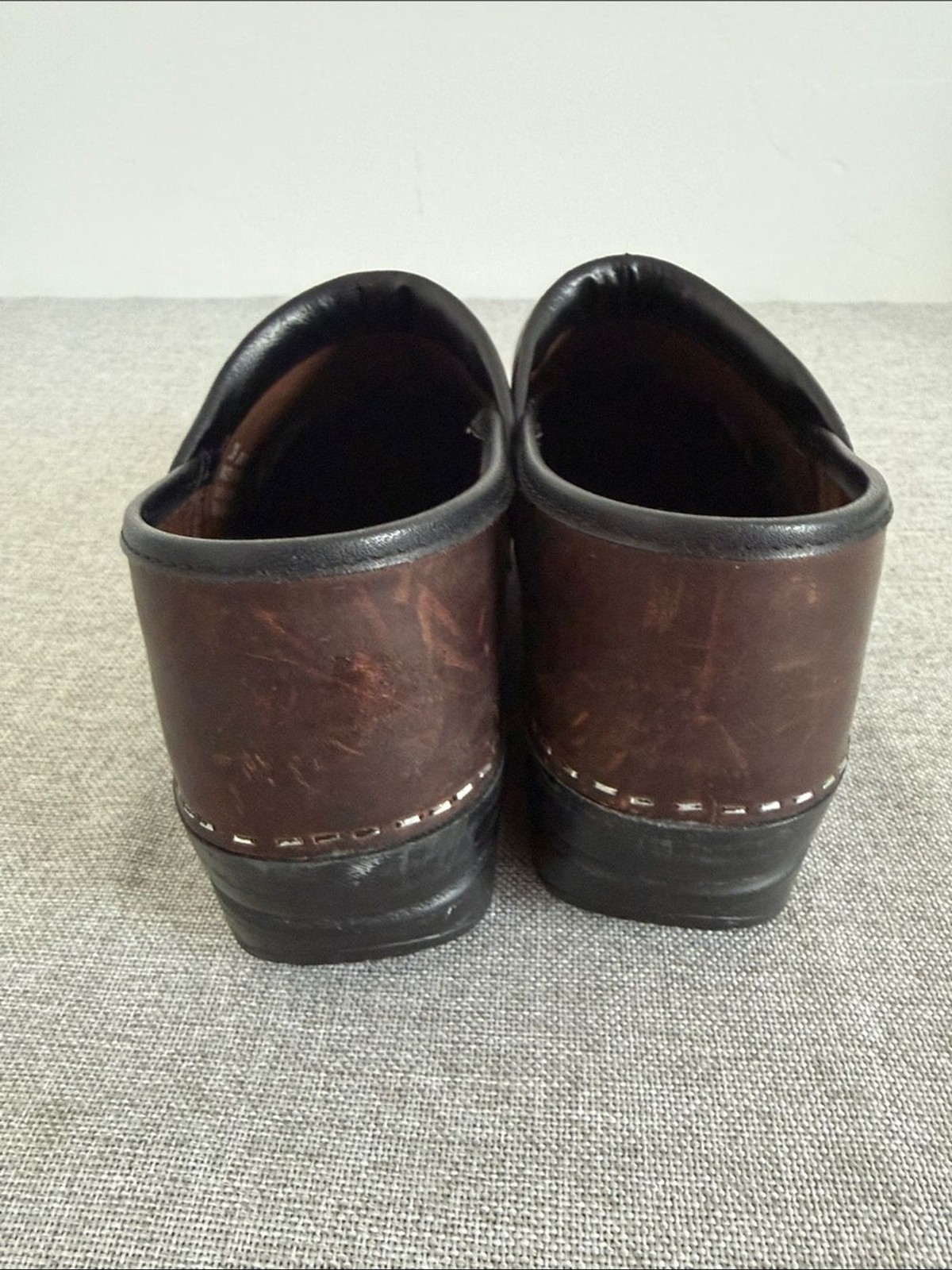 Dansko Brown Leather Slip-On Clogs with Black Trim