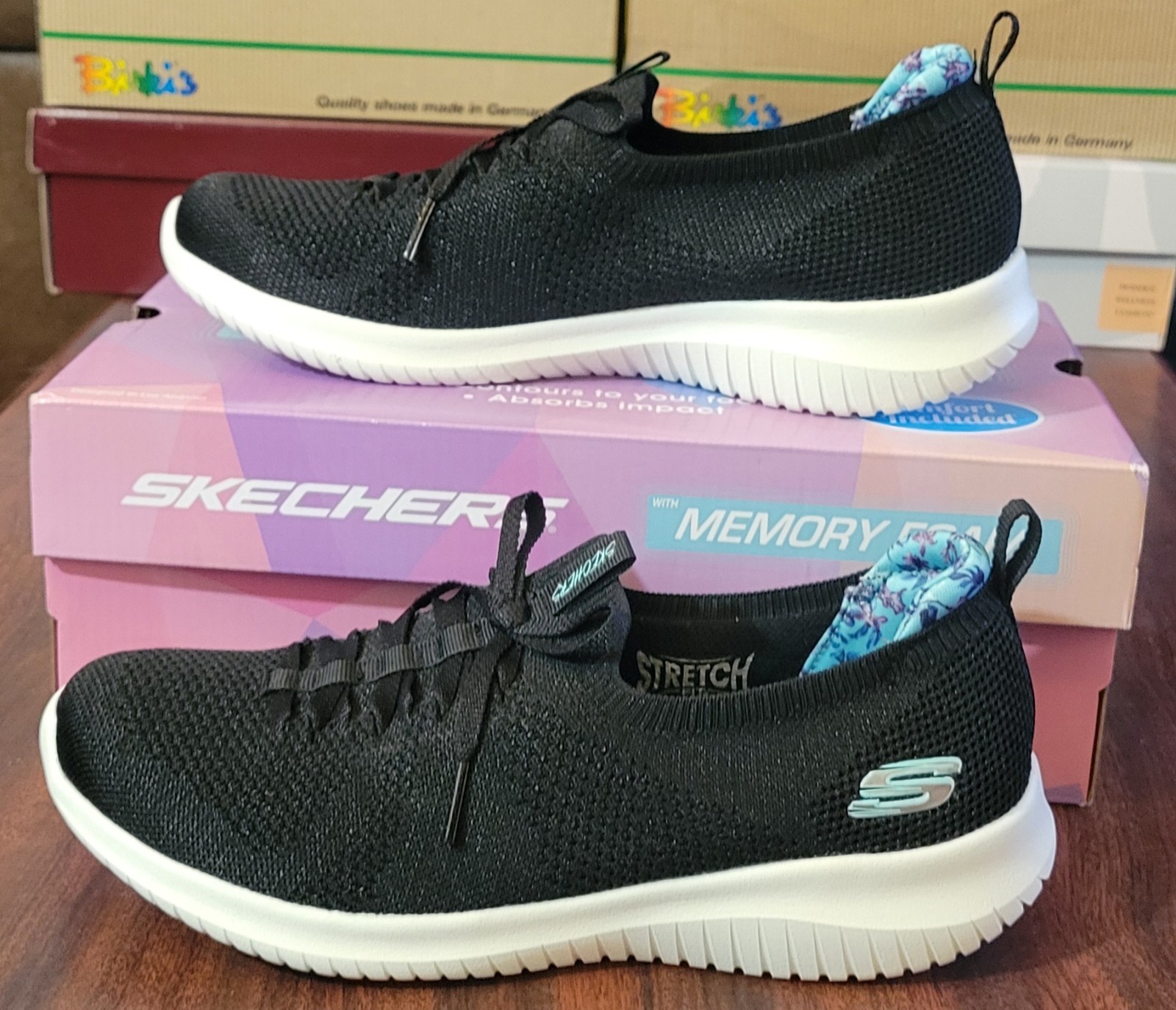 Skechers Women’s 9W Slip-on Faux Tie Flourishing Views-Black
