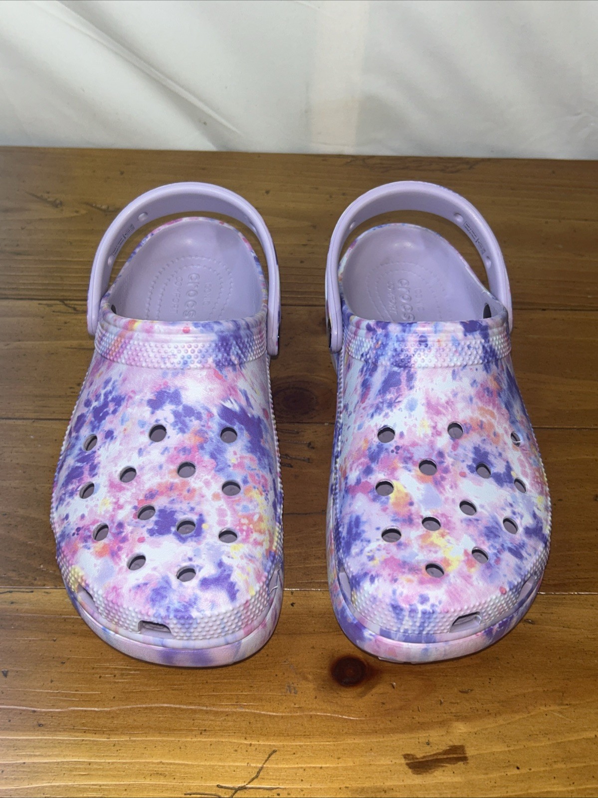 Crocs Classic Platform Clogs with a tie-dye pattern. Size 8