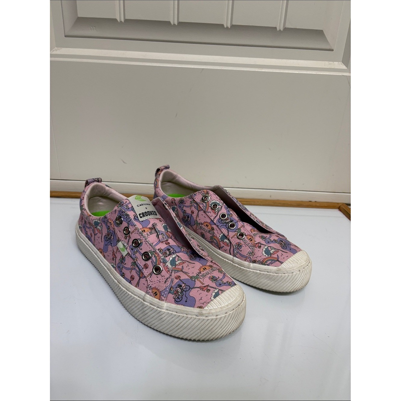 Cariuma Women’s Pink Graphic Slip-On Sneakers with Multi-Color Print