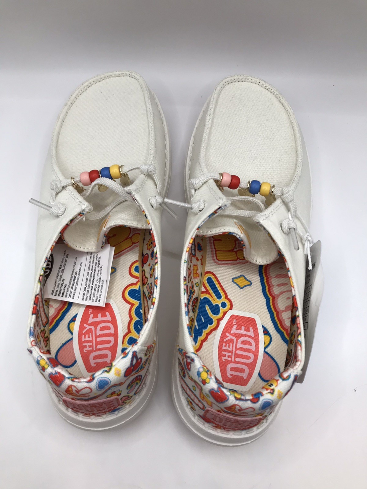 WOMEN’S OFF WHITE/MULTI HEY DUDE WENDY DANGLE CHARMS SLIP ON SNEAKER SIZE 7 NWT