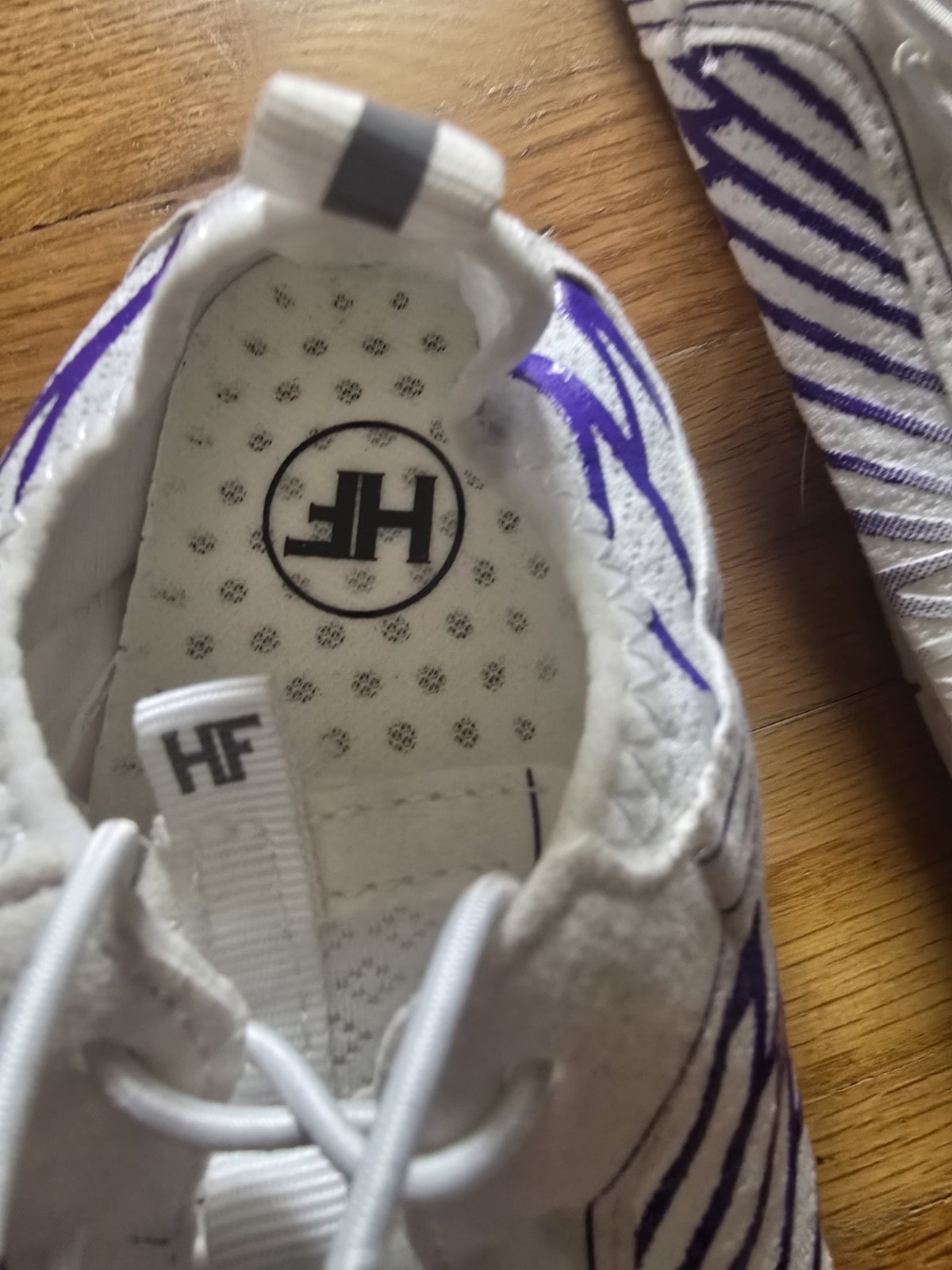Hike Footwear “Lorax Pro” white and purple barefoot shoes featuring a drawstring