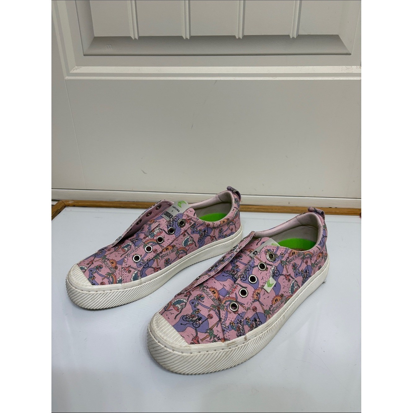 Cariuma Women’s Pink Graphic Slip-On Sneakers with Multi-Color Print