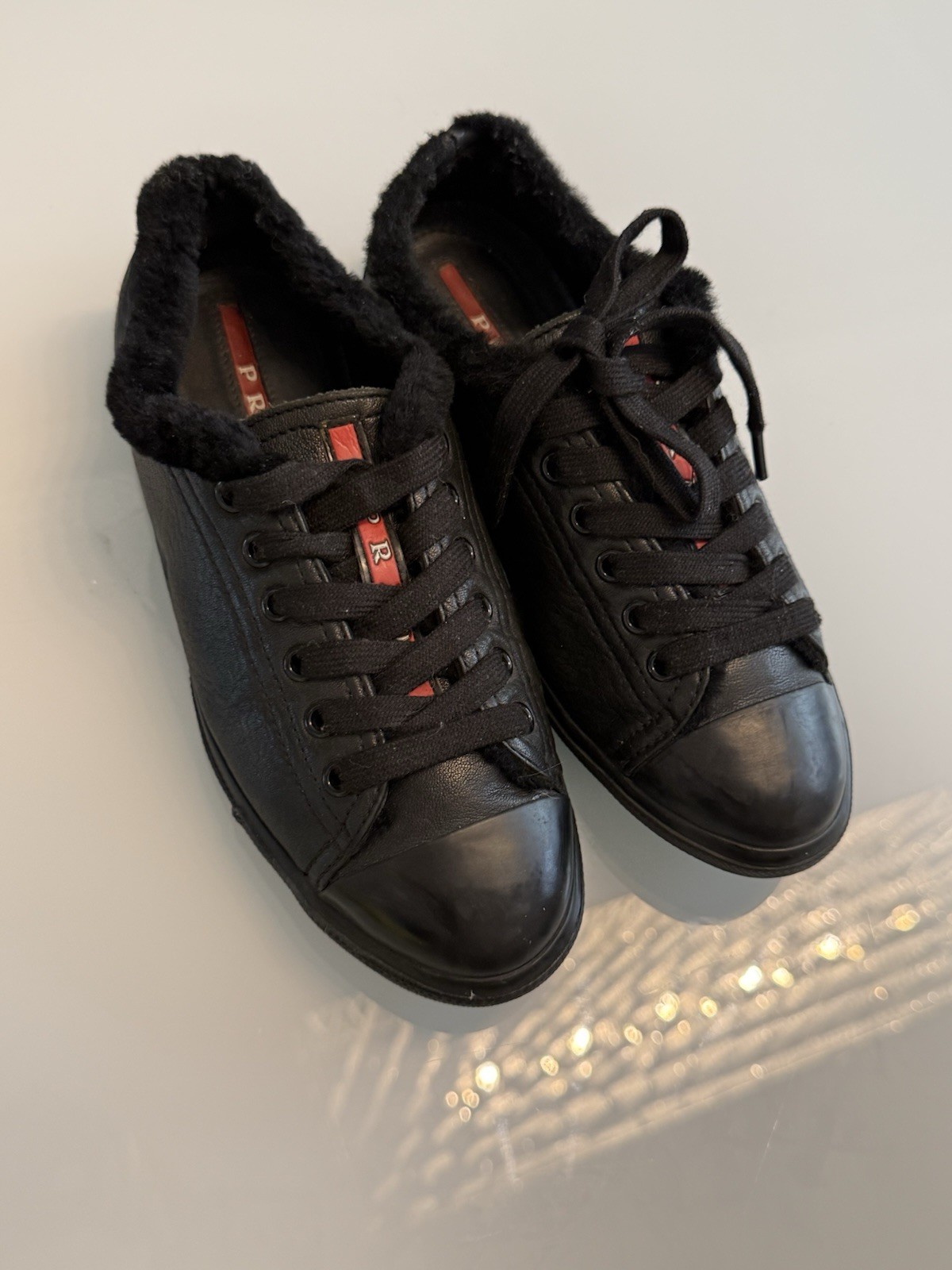 Prada Leather Shearling Trim Sneakers – Excellent Condition