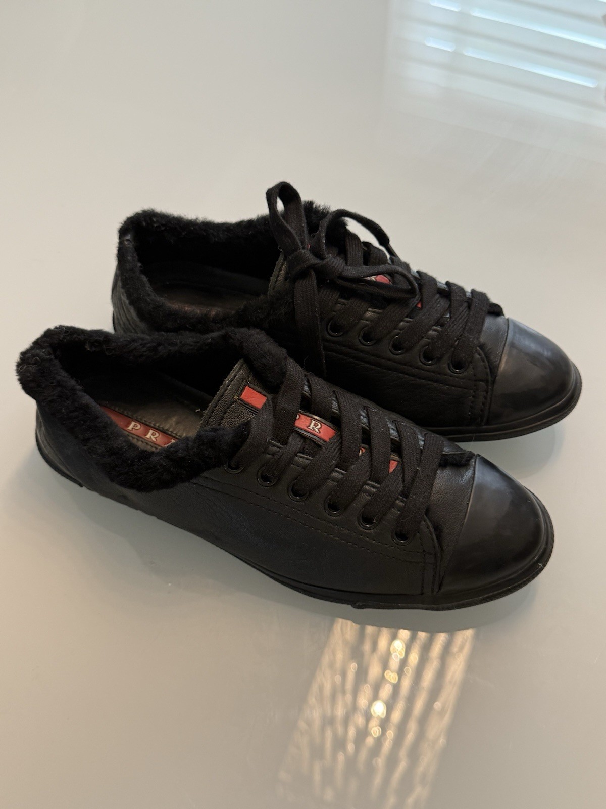 Prada Leather Shearling Trim Sneakers – Excellent Condition