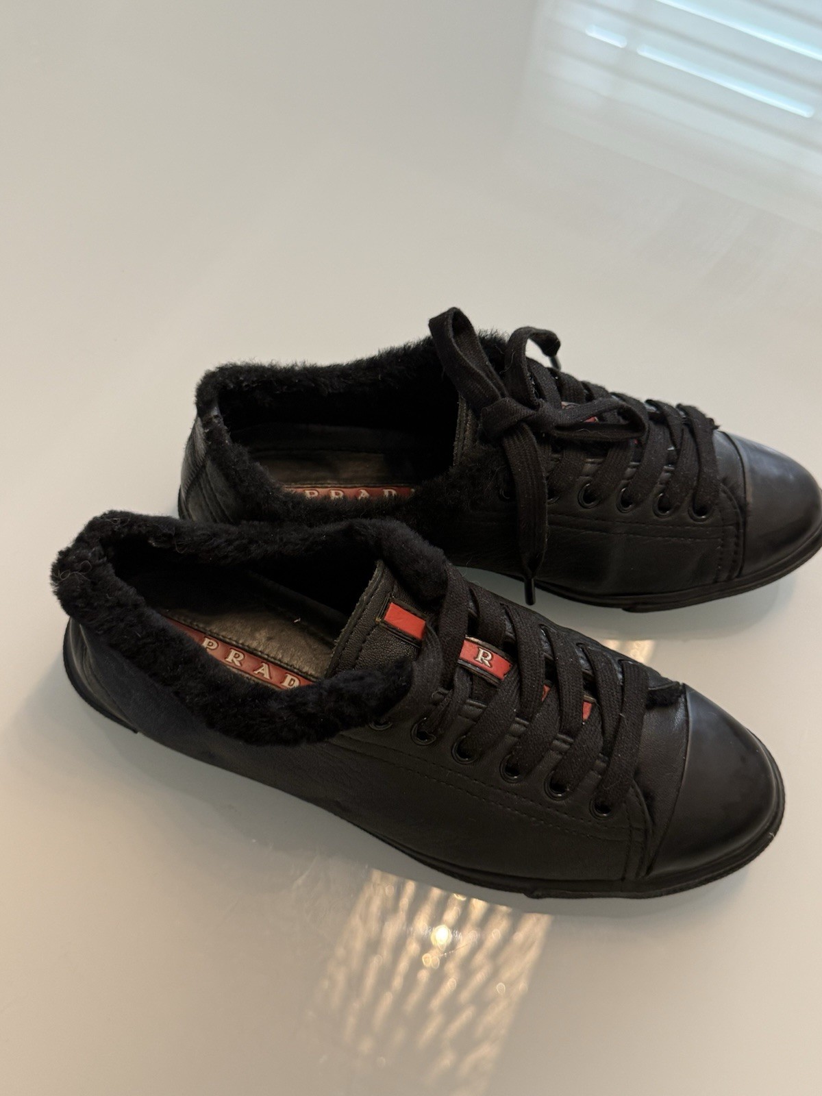 Prada Leather Shearling Trim Sneakers – Excellent Condition