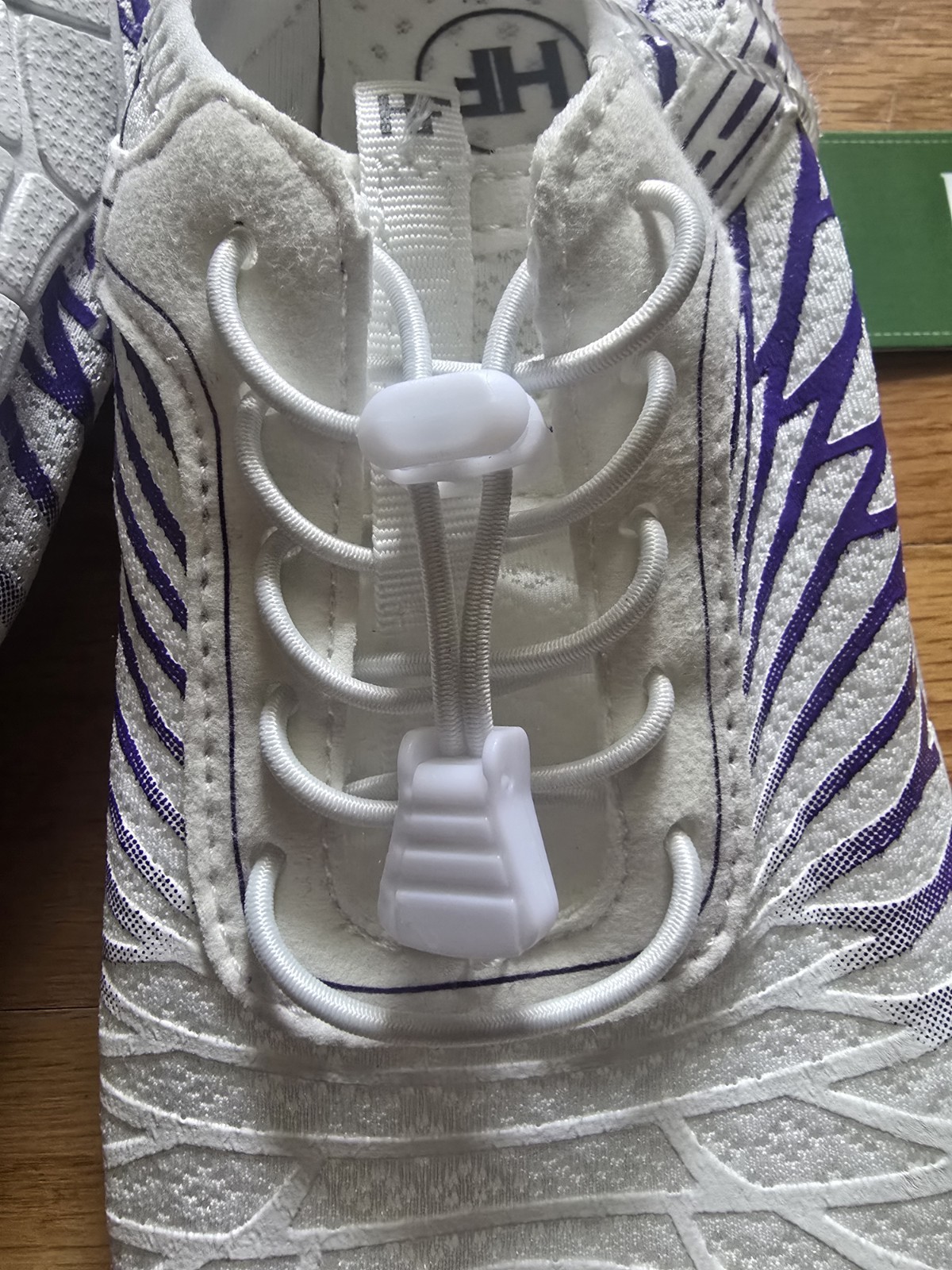Hike Footwear “Lorax Pro” white and purple barefoot shoes featuring a drawstring