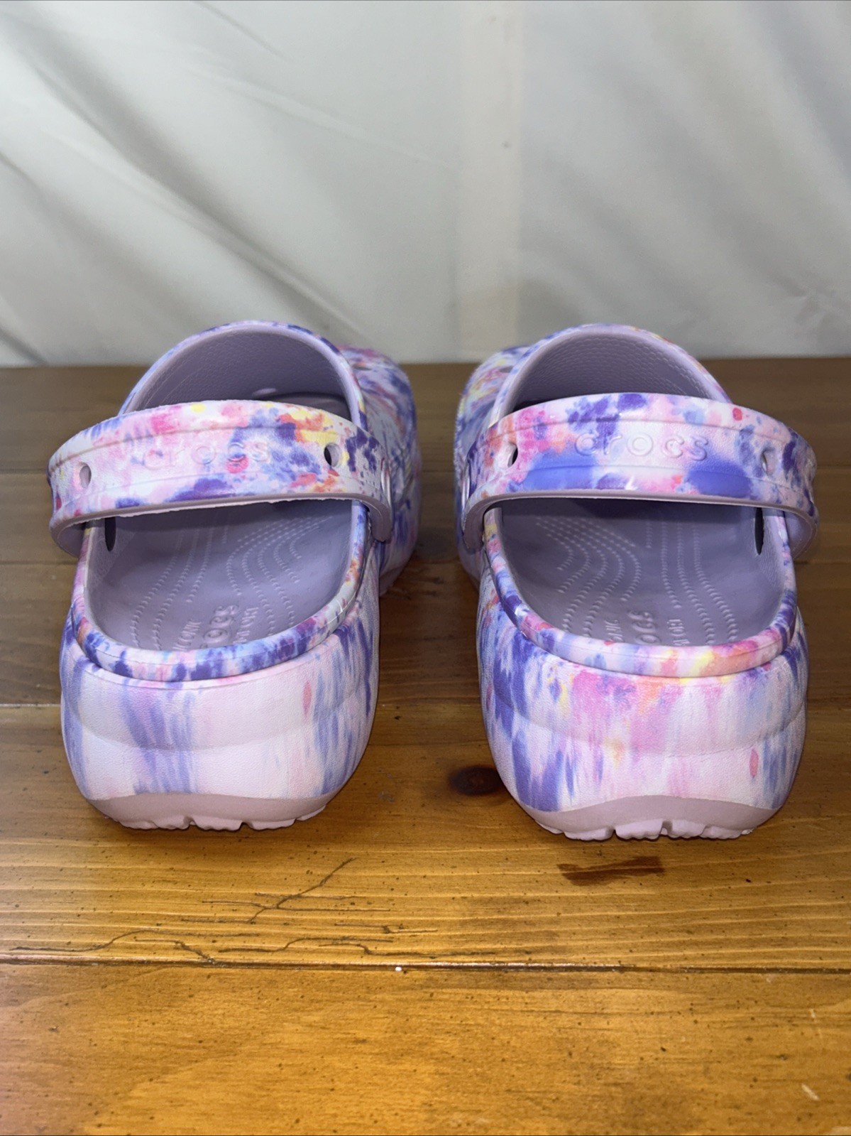 Crocs Classic Platform Clogs with a tie-dye pattern. Size 8