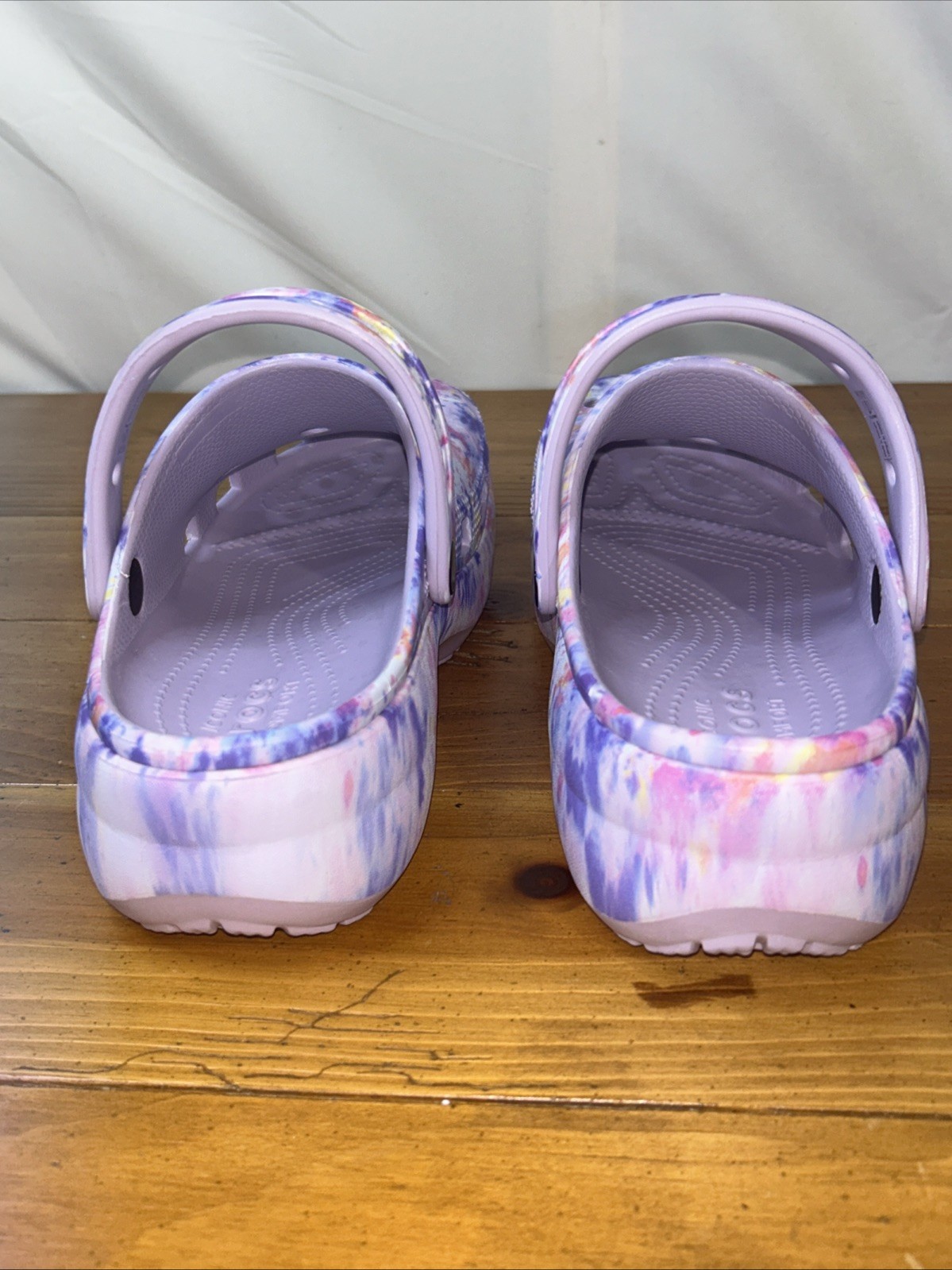 Crocs Classic Platform Clogs with a tie-dye pattern. Size 8