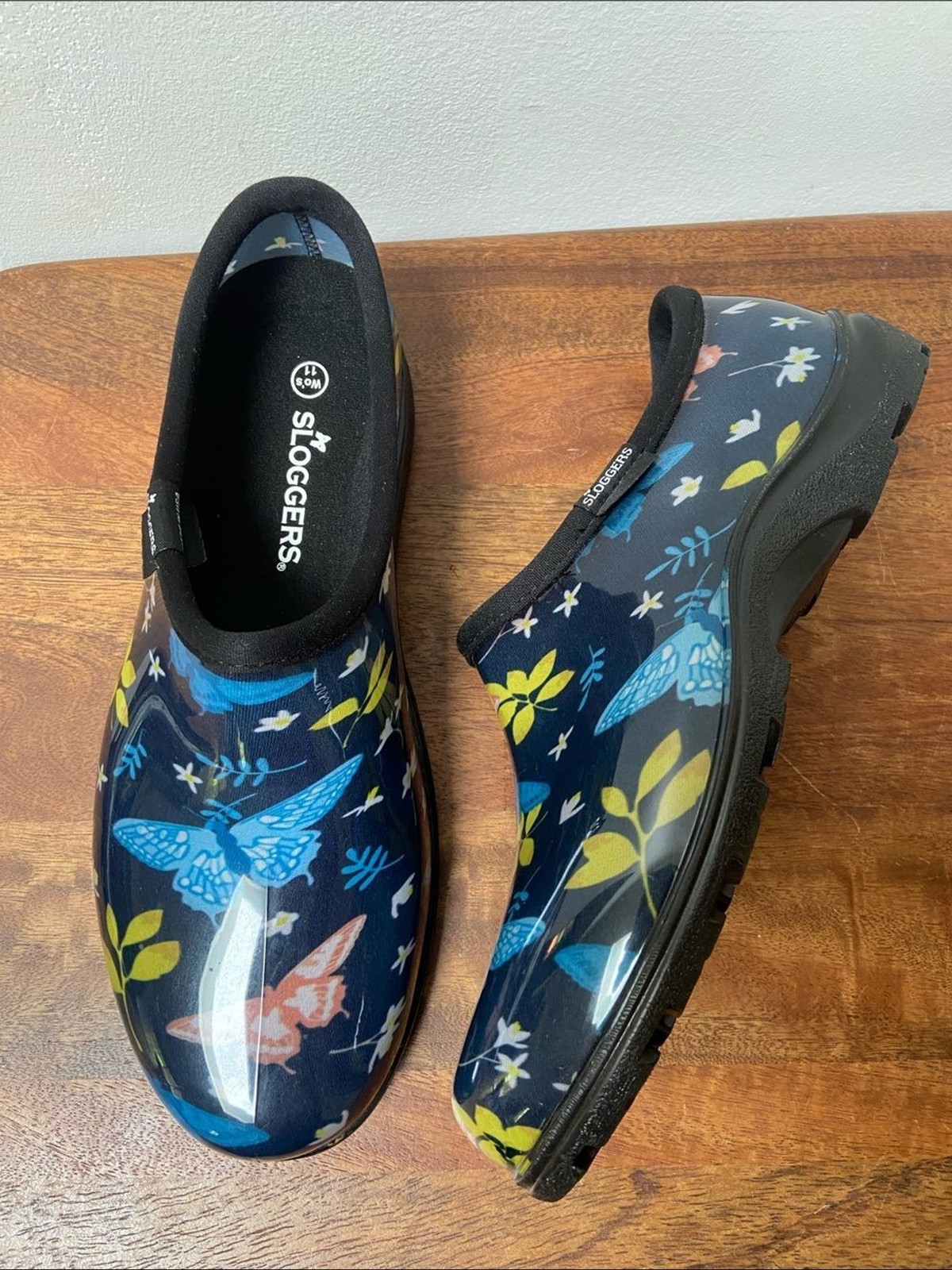 Sloggers Floral Butterfly Slip-On Clogs – Navy with Blue, Yellow & Coral Accents