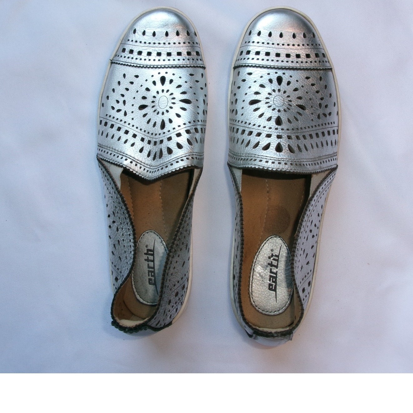 Earth Tangelo Silver Metallic Laser Cut Slip On Sneakers Women’s