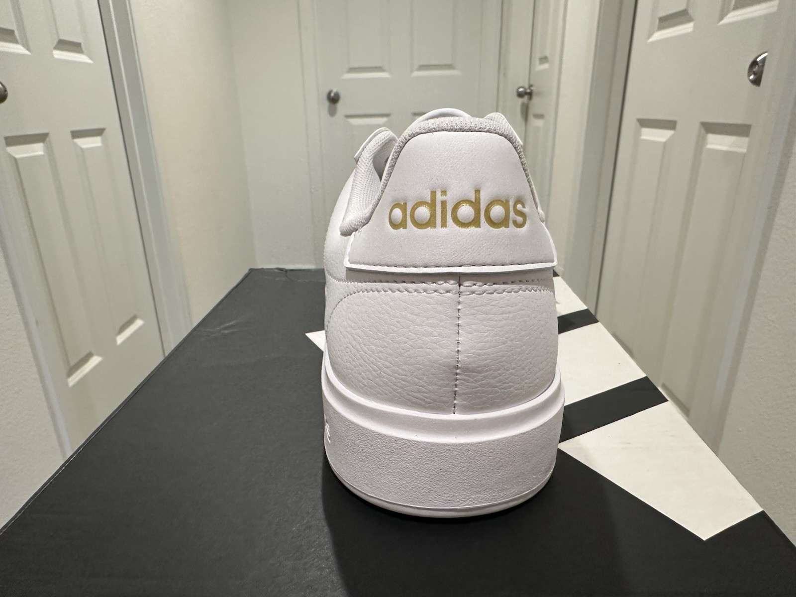 Adidas Grand Court 2.0 in a white colorway with gold lettering. Women’s 11. ￼