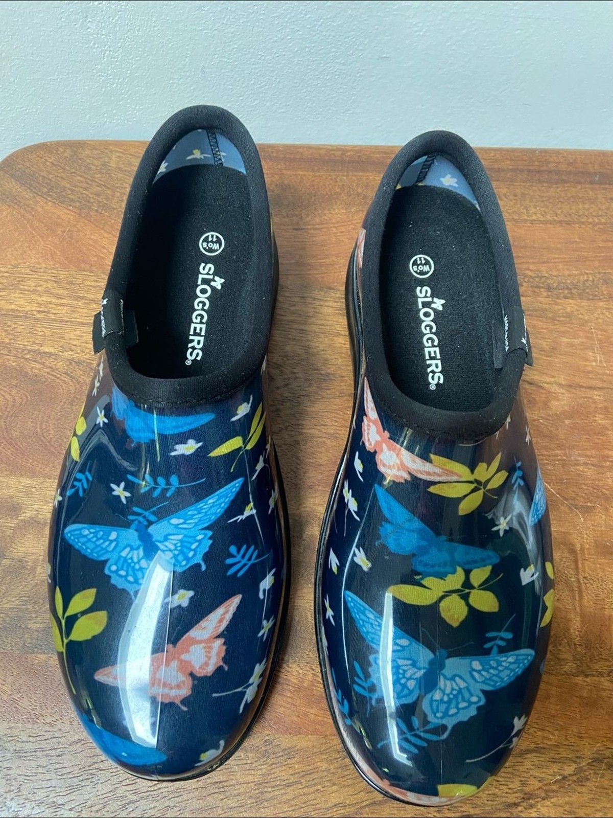 Sloggers Floral Butterfly Slip-On Clogs – Navy with Blue, Yellow & Coral Accents