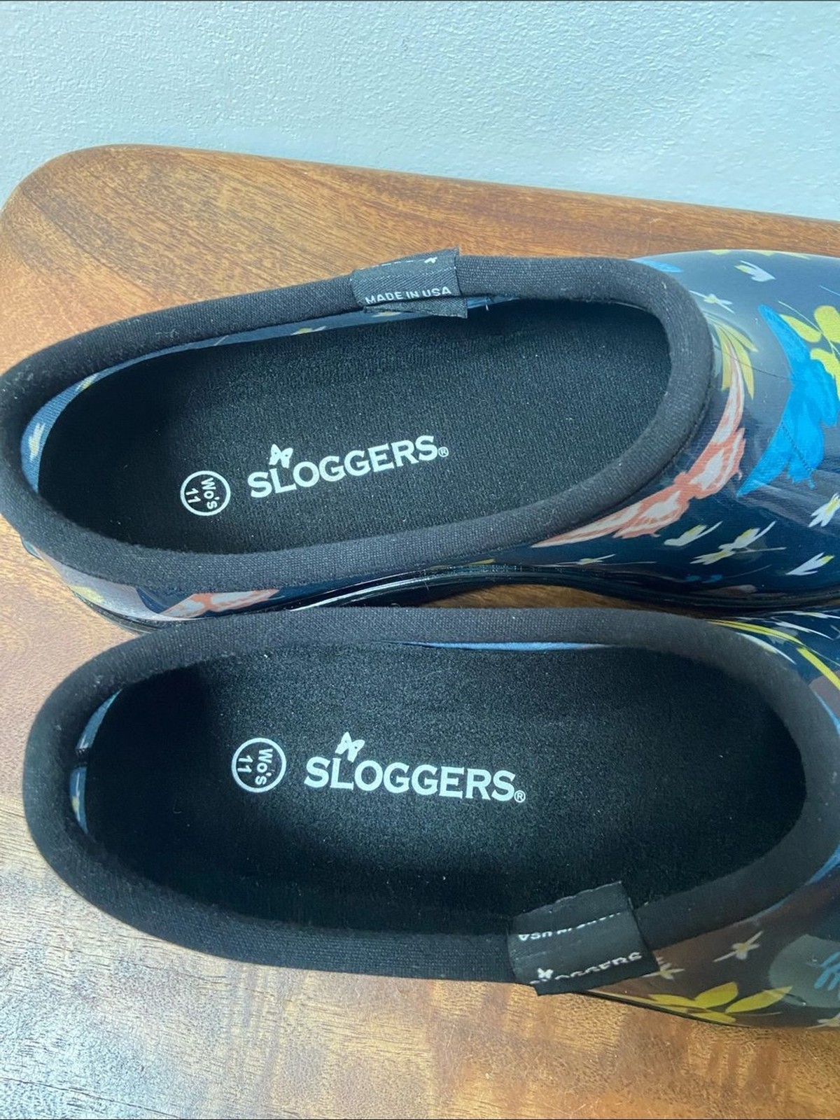 Sloggers Floral Butterfly Slip-On Clogs – Navy with Blue, Yellow & Coral Accents