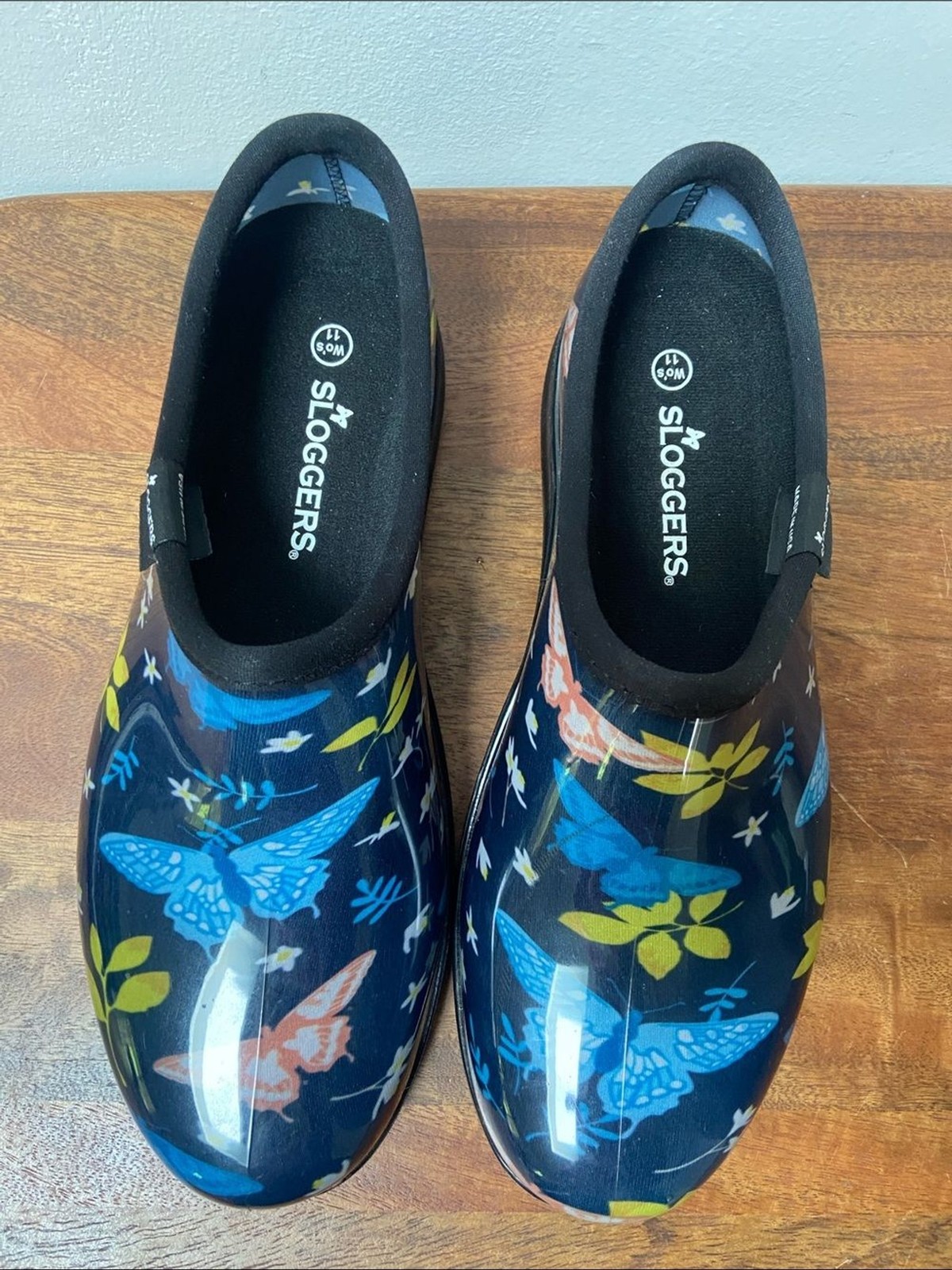 Sloggers Floral Butterfly Slip-On Clogs – Navy with Blue, Yellow & Coral Accents
