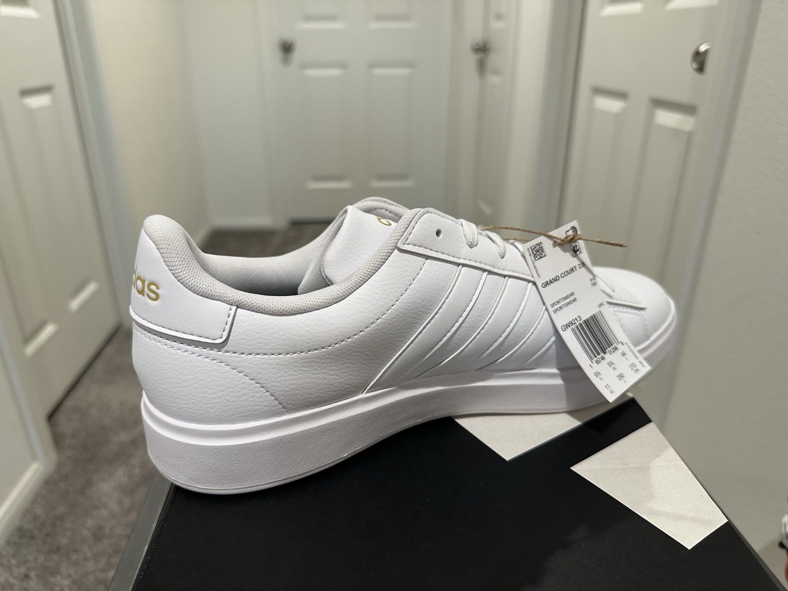 Adidas Grand Court 2.0 in a white colorway with gold lettering. Women’s 11. ￼