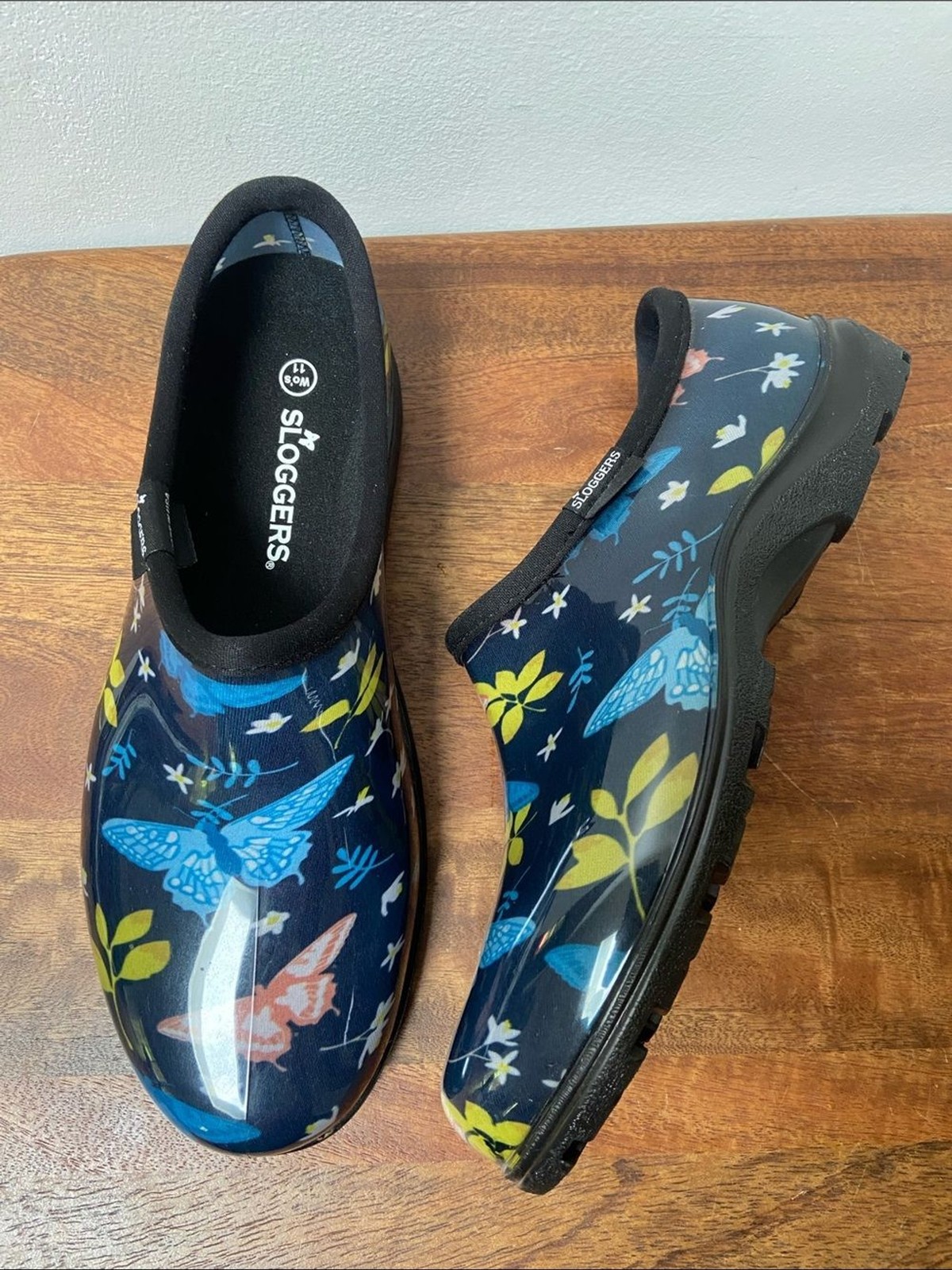Sloggers Floral Butterfly Slip-On Clogs – Navy with Blue, Yellow & Coral Accents