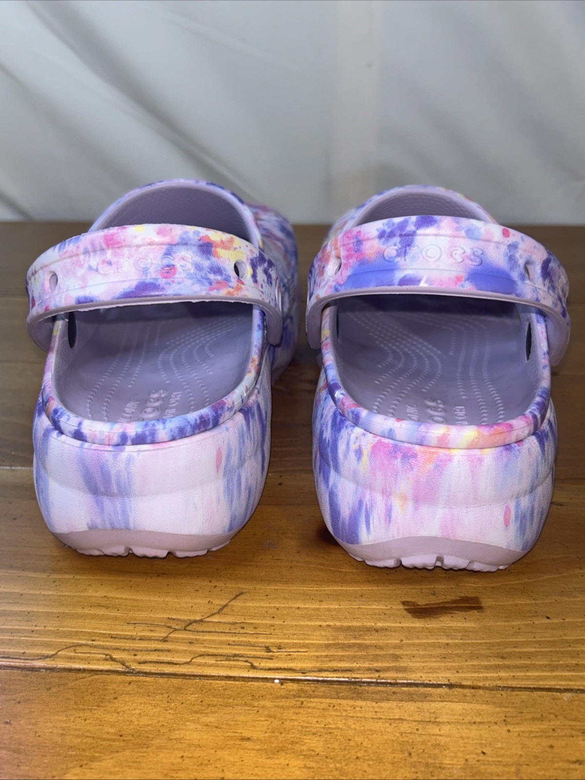 Crocs Classic Platform Clogs with a tie-dye pattern. Size 8