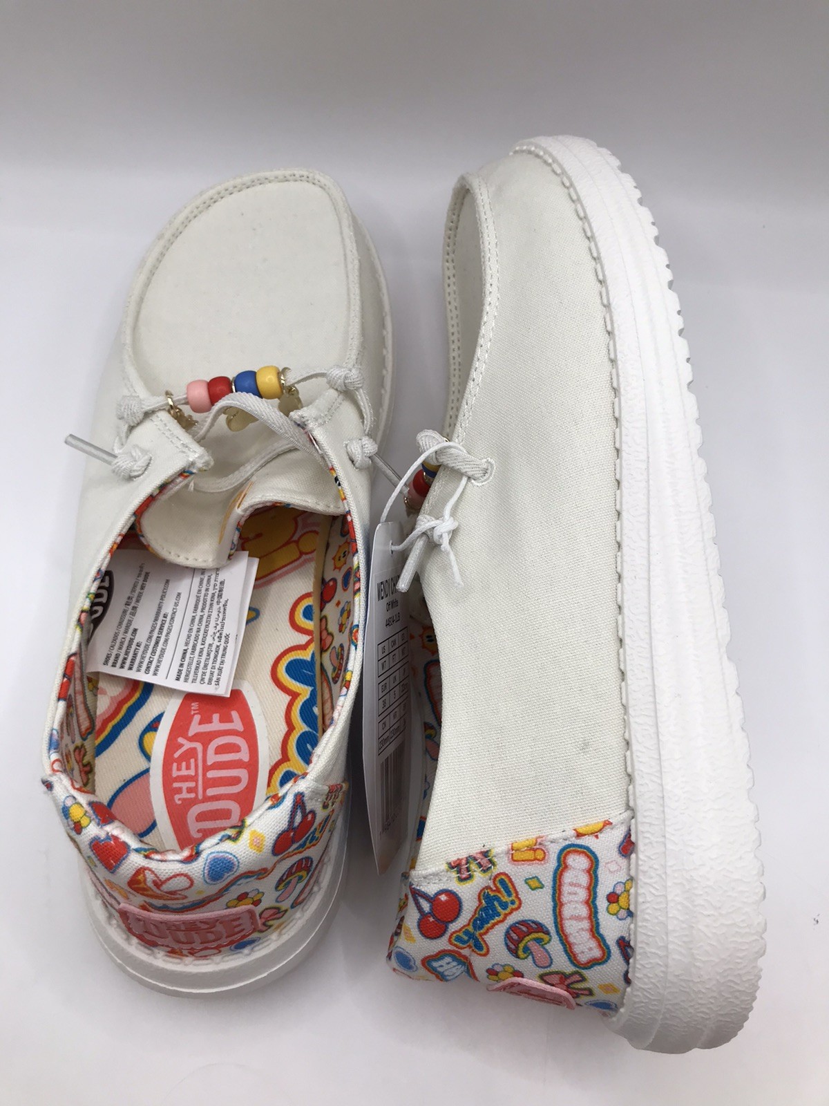 WOMEN’S OFF WHITE/MULTI HEY DUDE WENDY DANGLE CHARMS SLIP ON SNEAKER SIZE 7 NWT