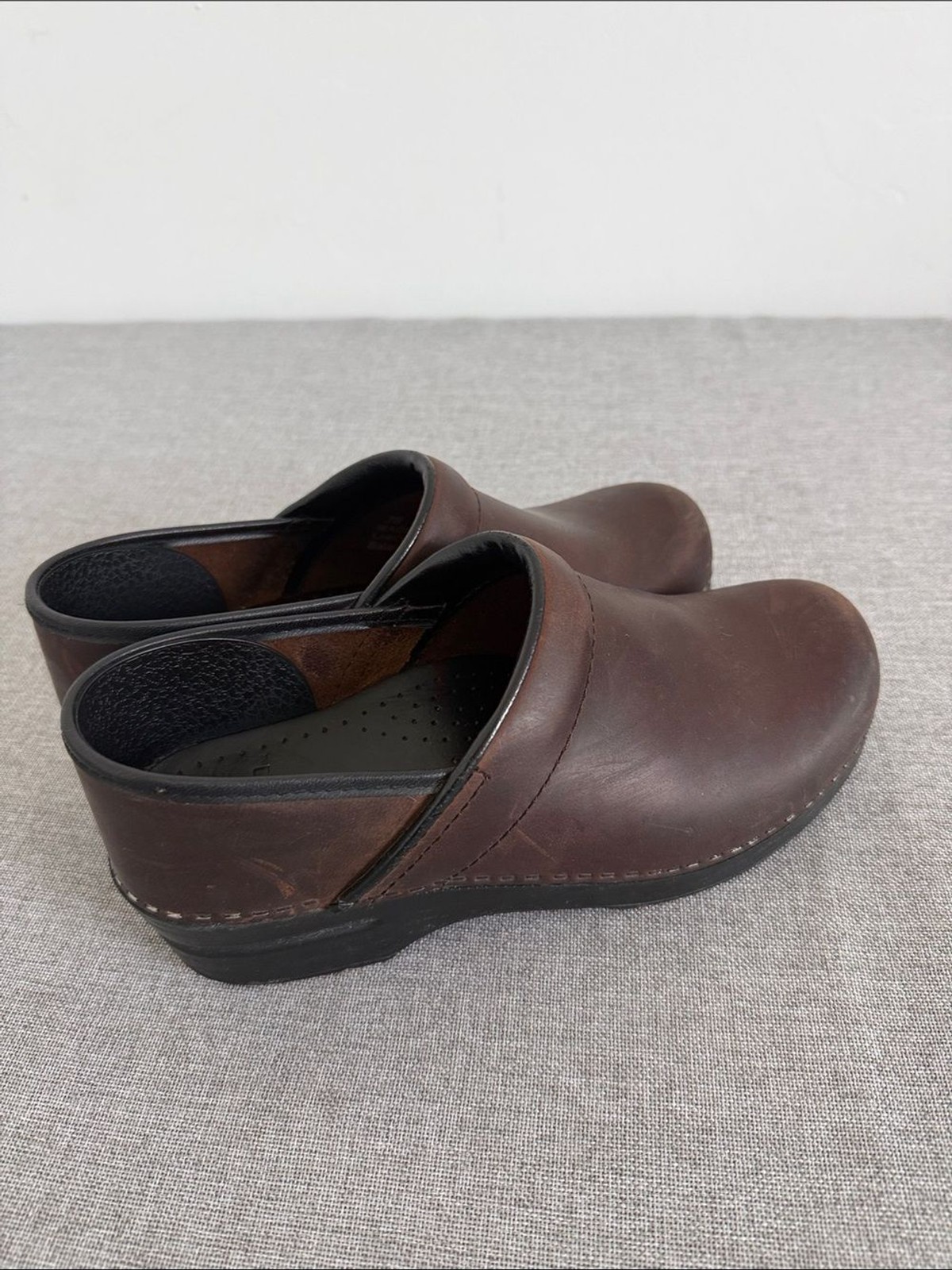 Dansko Brown Leather Slip-On Clogs with Black Trim
