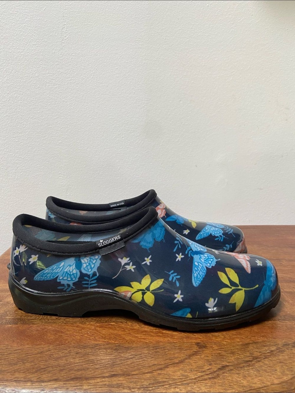Sloggers Floral Butterfly Slip-On Clogs – Navy with Blue, Yellow & Coral Accents